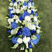 A Blue and white coffin spray