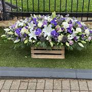 Purple and white Funeral Coffin Spray