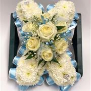 Light Blue And White Kiss Funeral Tribute