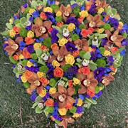 Multicoloured heart funeral tribute