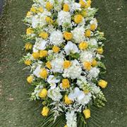 Yellow and white coffin spray 