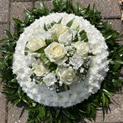 Posy pad funeral tribute foliage edge
