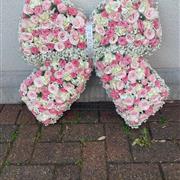 Pretty Pink Bow Shape Funeral tribute
